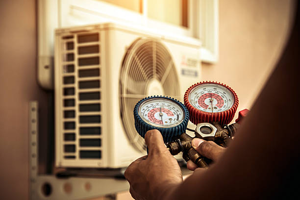 Professional Ac Installation technician working in Athens, IL